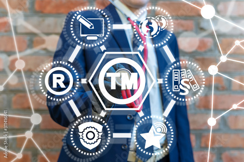 Tableau sur toile Man touches stethoscope to tm symbol on virtual screen