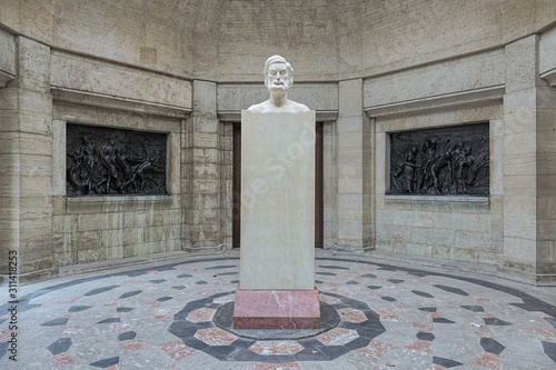 Jena, Germany. Herma of the German physicist, optical scientist and inventor Ernst Abbe in Ernst Abbe Memorial at Carl Zeiss square. The memorial was unveiled on July 30, 1911. photo