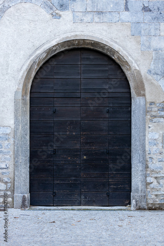 ancient wooden door of entrance building  Europe