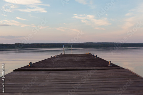 Old wooden pier at sunset