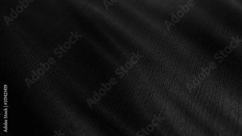 Black fabric cloth material is wave. Fashion pattern, detailed burlap. 