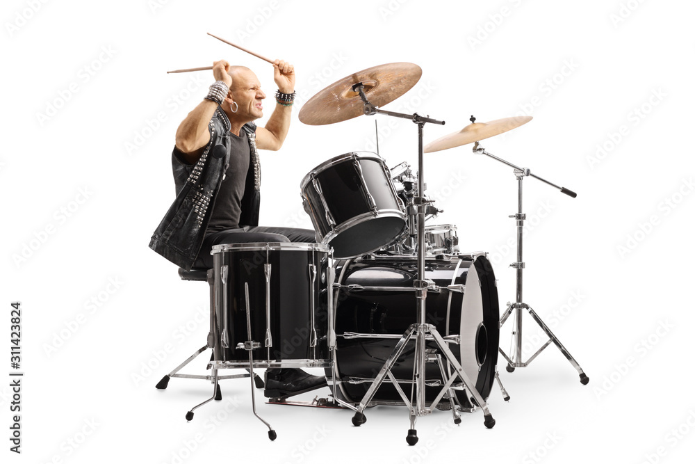 Fototapeta premium Male drummer in a leather vest performing