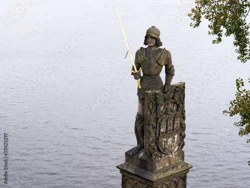 Sticker stone statue of a knight near the charles bridge in prague