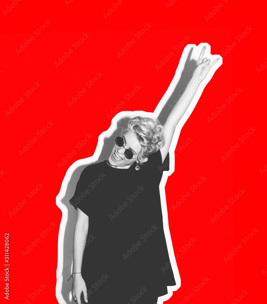 Stylish fashionable blonde with short hair from a multi-colored collage. Crazy girl in a black T-shirt and rock sunglasses screaming, holding her head. Rocky emotional woman, black and white tones red