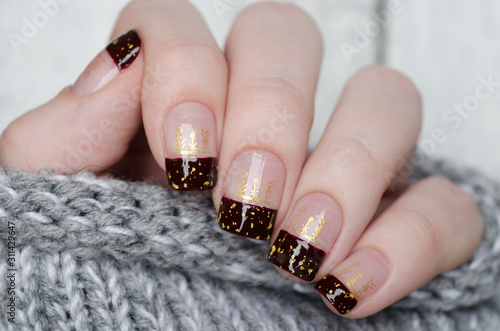 Bordeaux french manicure with a gold flakes