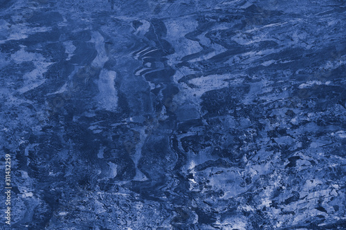 Trend color 2020 classic blue, top view, layout for design. Mountain texture in trendy blue color.