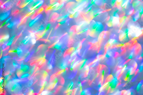 Konstfotografi Blurred background with holographic sparkles and lights.