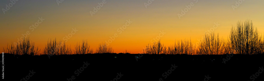 Panorama of a golden winter sunset Panorama of a golden winter sunset