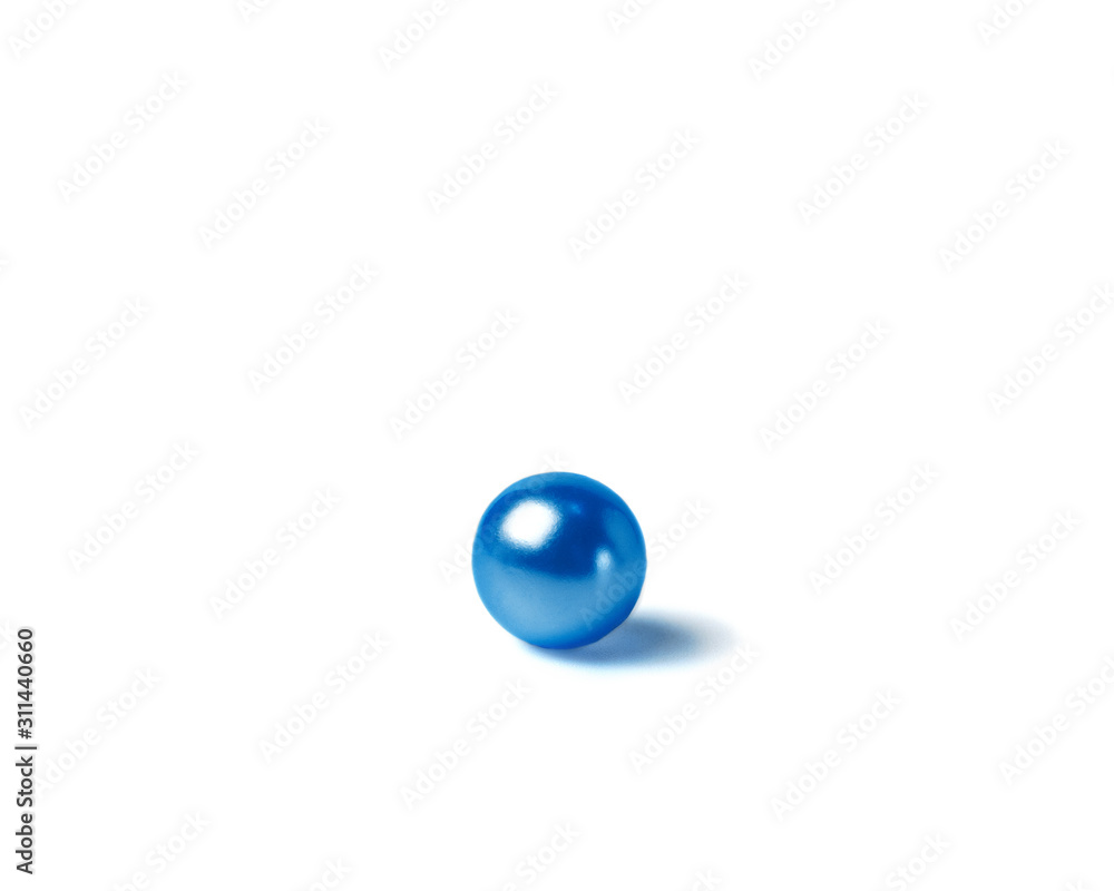 Classic blue. Color of the year. Round mother of pearl beads on white background Classic blue. Color of the year. Round mother of pearl beads on white background