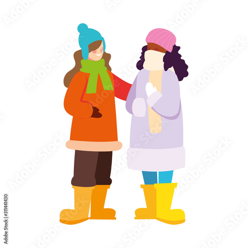 women standing with winter clothes on white background