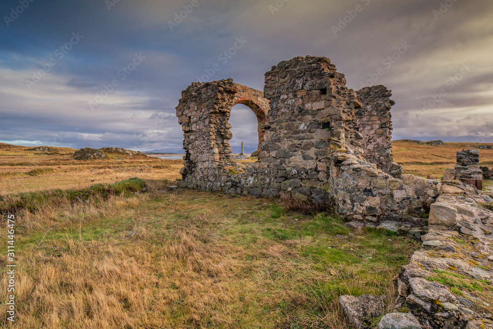 Derelict St. Dwynwen chapel  on Located at the far end of a pleasant beach near Newborough Warren, this narrow finger of land is an ideal picnic site during fine weather.