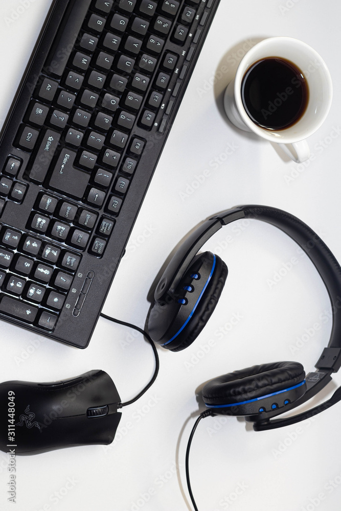 work items in the office, mouse, keyboard, headset to hear that music to cheer up and a cafe to give strength. work items in the office, mouse, keyboard, headset to hear that music to cheer up and a cafe to give strength.