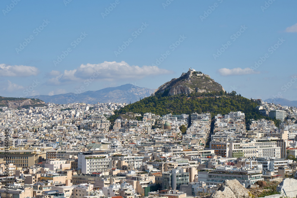 Aerial panoramic view of the Lycabettus Hill and Athens city from Acropolis. It is a Cretaceous limestone hill in Athens, Greece.