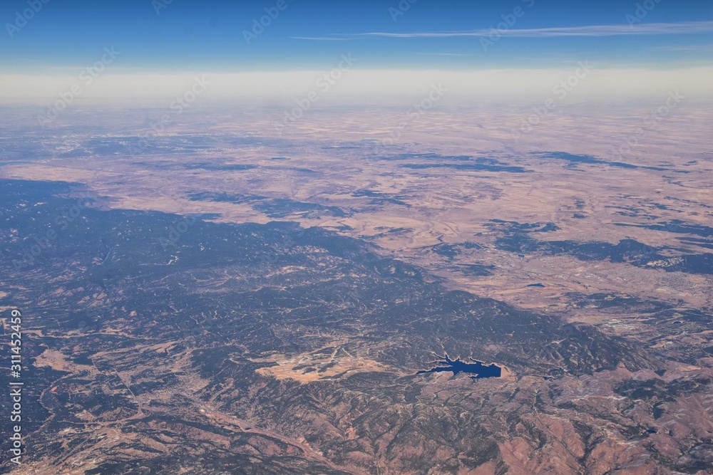 Colorado Rocky Mountains Aerial panoramic views from airplane of abstract Landscapes, peaks, canyons and rural cities in southwest Colorado and Utah. United States of America. USA.