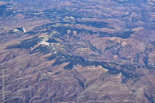 Colorado Rocky Mountains Aerial panoramic views from airplane of abstract Landscapes, peaks, canyons and rural cities in southwest Colorado and Utah. United States of America. USA.