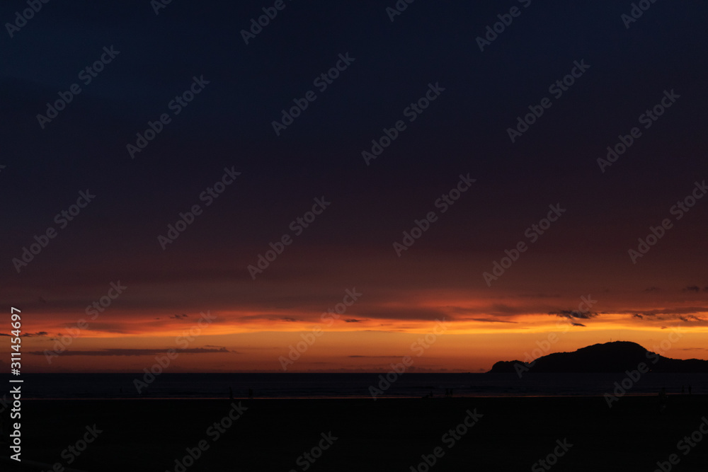 Fototapeta premium orange sunset in the mountains