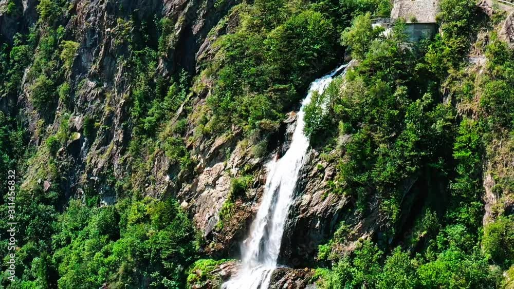 Close and slide by a big waterfall in the austrian mountains Close and slide by a big waterfall in the austrian mountains