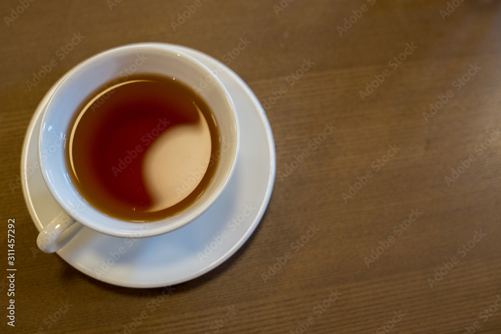 top view of a cup of golden oolong tea top view of a cup of golden oolong tea