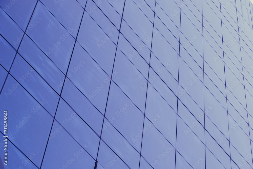 Blue glass windows of modern office building Blue glass windows of modern office building