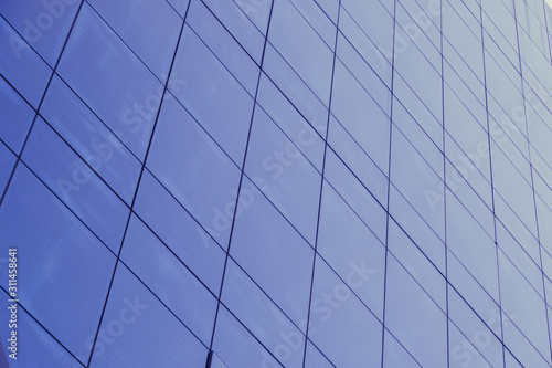 Blue glass windows of modern office building