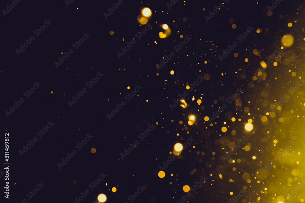 Abstract gold bokeh on black Abstract gold bokeh on black