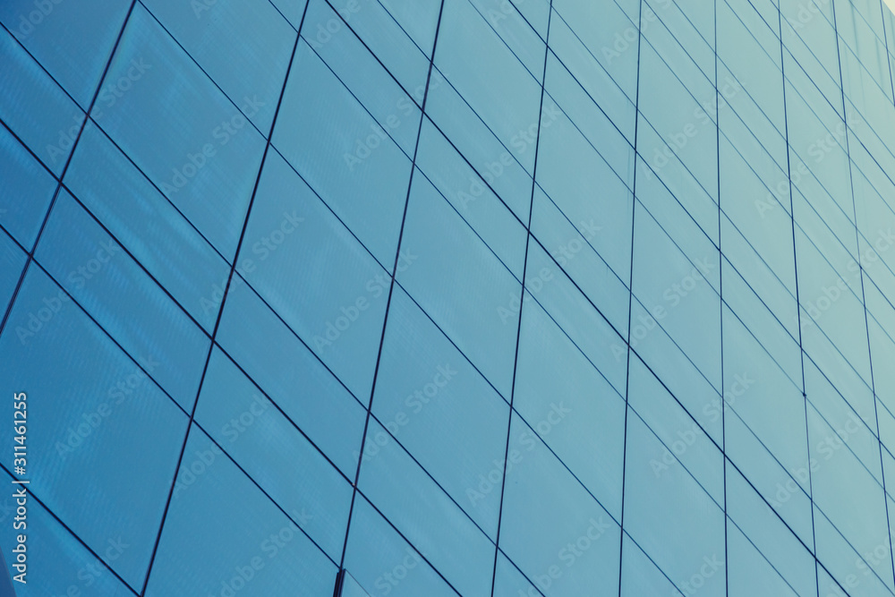 Blue glass windows of modern office building Blue glass windows of modern office building