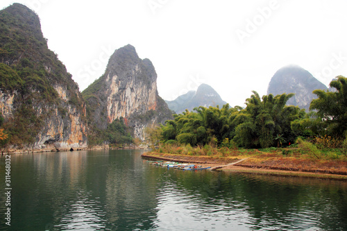 Cruise ship travels the route along the Li river from Guilin to Yangshou,China