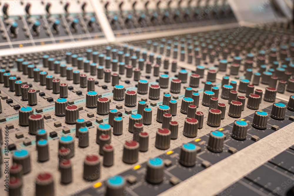 Fototapeta premium Close-up of the knobs of mixer in recording studio.