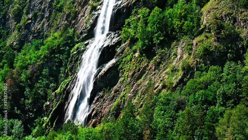 Close and slide by a big waterfall in the austrian mountains Close and slide by a big waterfall in the austrian mountains