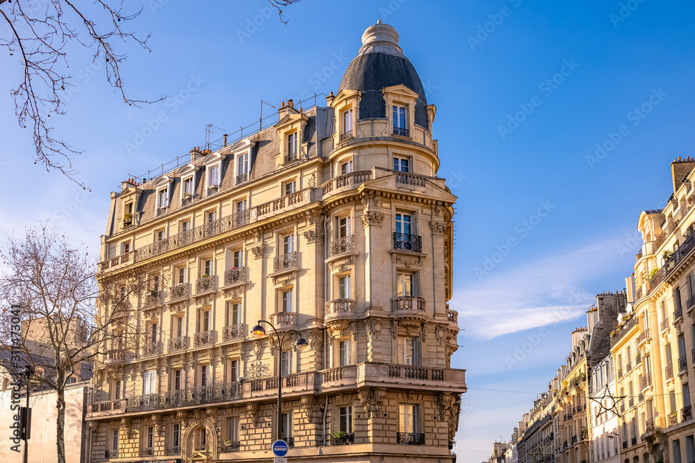 Paris, typical building, parisian facade and windows rue de Rivoli 