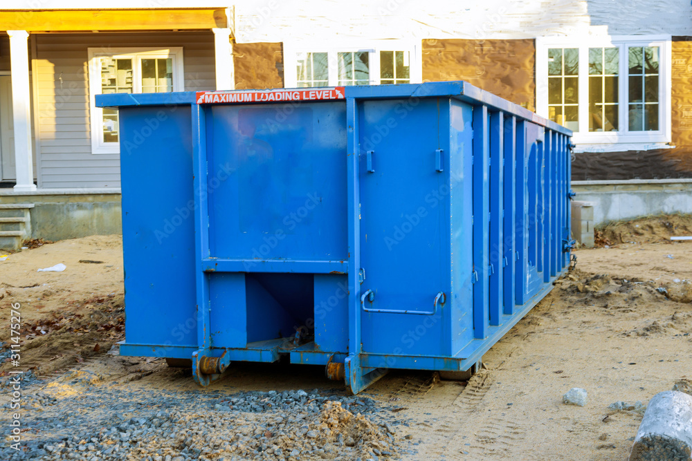 Recycling container trash dumpsters being full with garbage Recycling container trash dumpsters being full with garbage