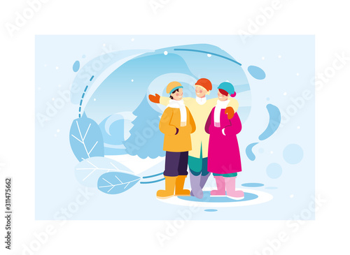 group of people with winter clothes in landscape with snowfall © djvstock