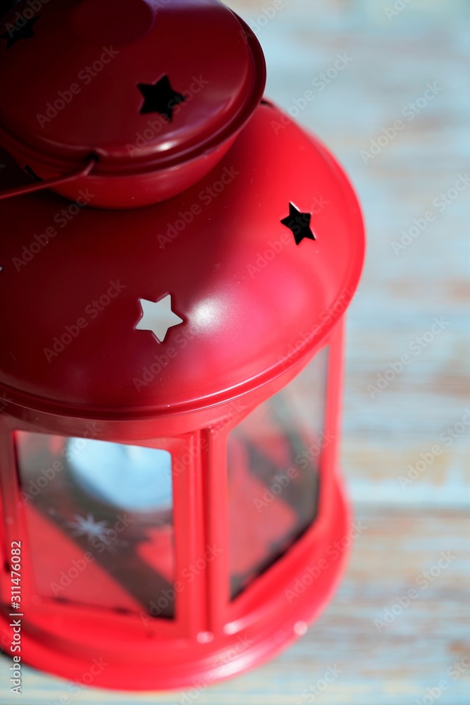 top view on red retro lantern on wooden table