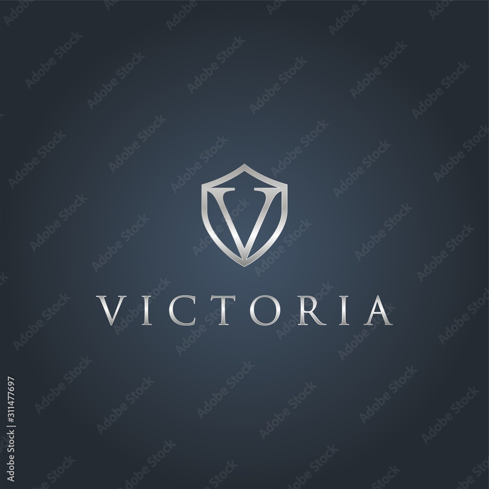 Naklejka premium Initial v with shield metal metallic silver logo on a dark background