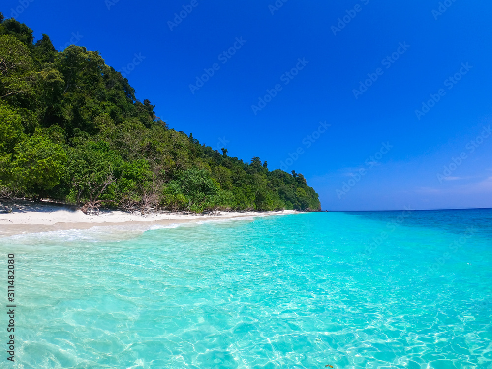 clear water and blue sky beautiful beach
