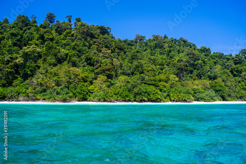 clear water and blue sky beautiful beach