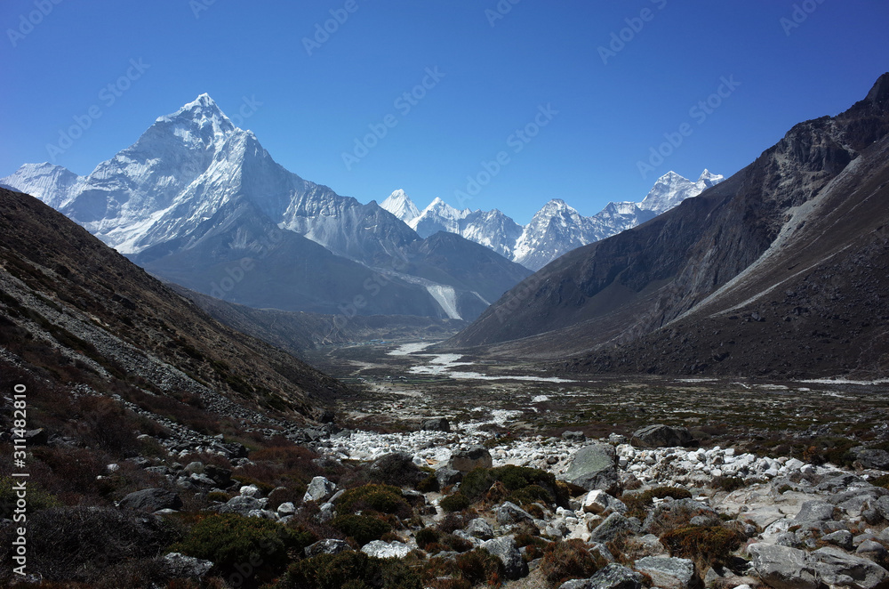 Everest trek, Way down from Dughla to Pheriche with view of Ama Dablam mountain. Himalayas, Nepal