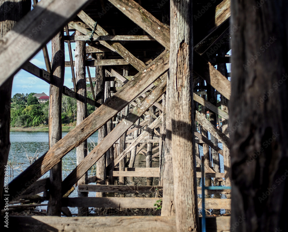 A wooden bridge over the river A wooden bridge over the river