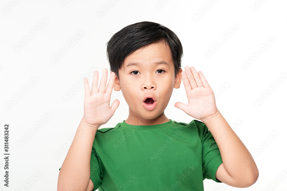 Cute asian schoolboy laughing and screaming isolated on white background. Cute asian schoolboy laughing and screaming isolated on white background.