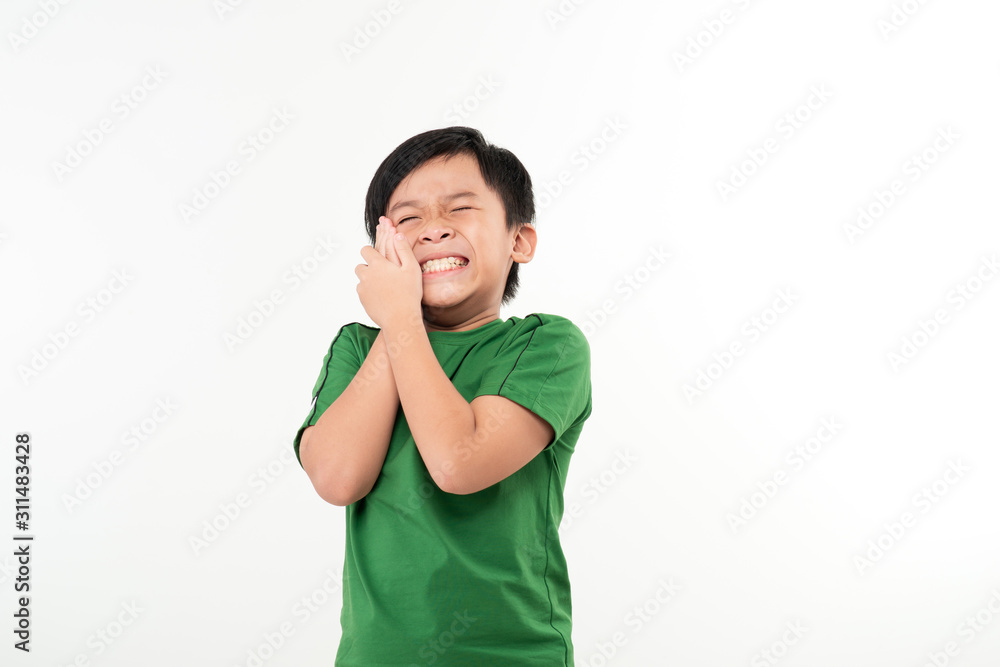Handsome asian schoolboy with toothache hold his cheek with hand Handsome asian schoolboy with toothache hold his cheek with hand