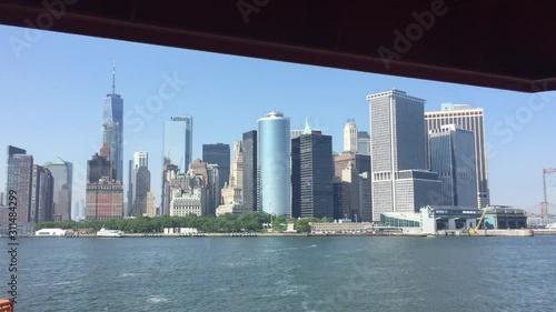 December 20, 2018 : View of Lower Manhattan from The Staten Island Ferry is New York City Department of Transportation runs 5.2 miles between the New York City boroughs of Manhattan and Staten Island.