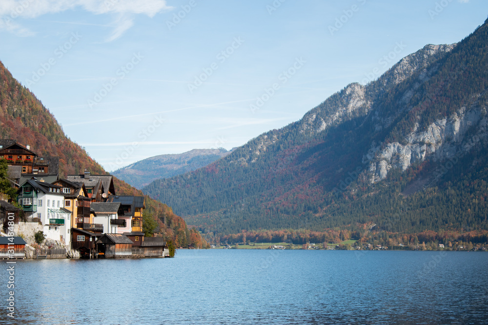 Admiring the colourful lakeside huts in Hallstatt, Austria