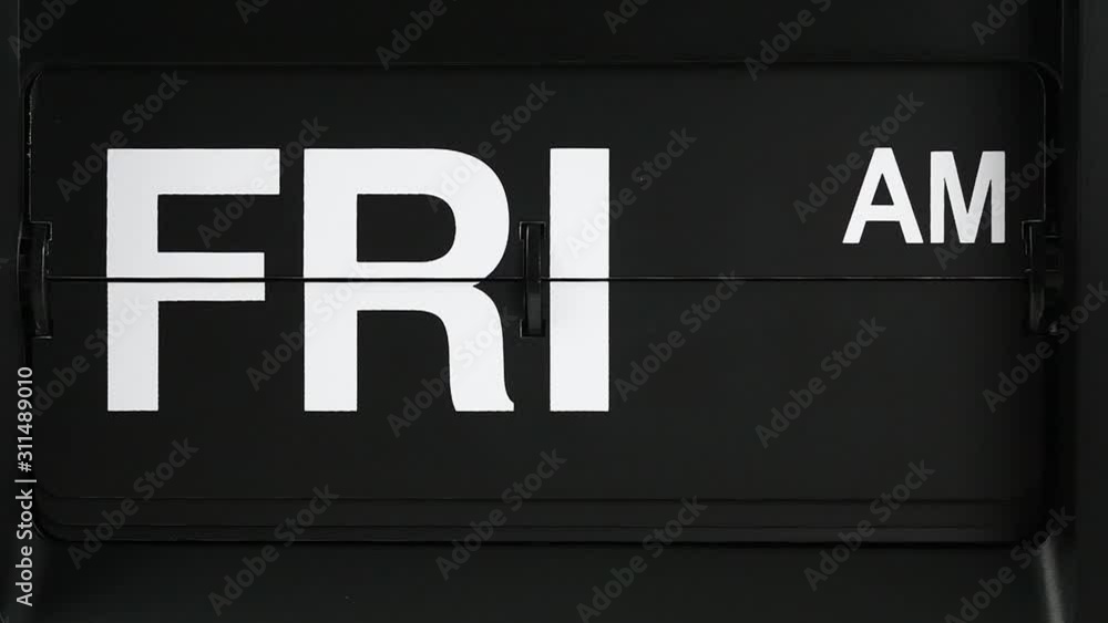 Retro flip clock calendar changing label days Thursday pm. to Friday am., Time concept. Retro flip clock calendar changing label days Thursday pm. to Friday am., Time concept.