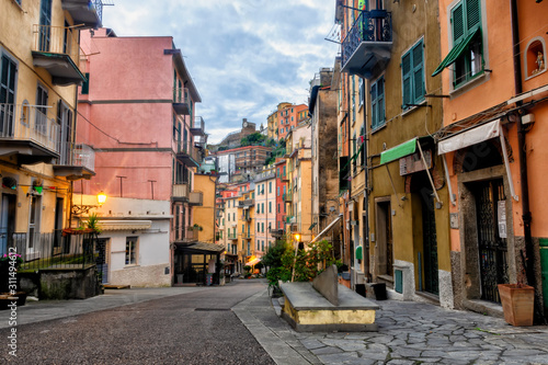 Fototapeta Naklejka Na Ścianę i Meble -  Riomaggiore Fishing Quarter, the harbor of a small Italian fishing village in the evening