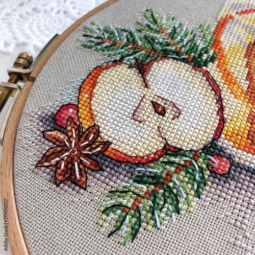 Bild auf Leinwand Cross stitch needlework process