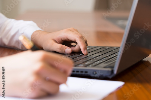 Businesswomen use laptops in the office