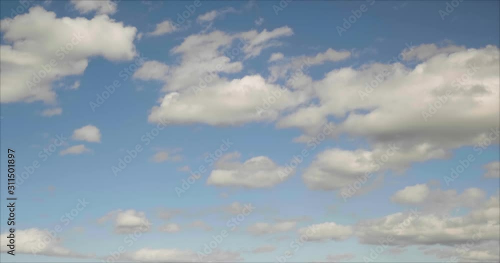 Time lapse of beautiful dramatic puffy clouds against blue skies. Time lapse of beautiful dramatic puffy clouds against blue skies.
