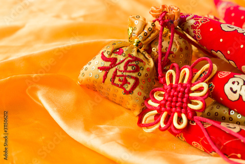 He sui fu bag, ruyi knot, Chinese knot, meaning red hot pepper. photo