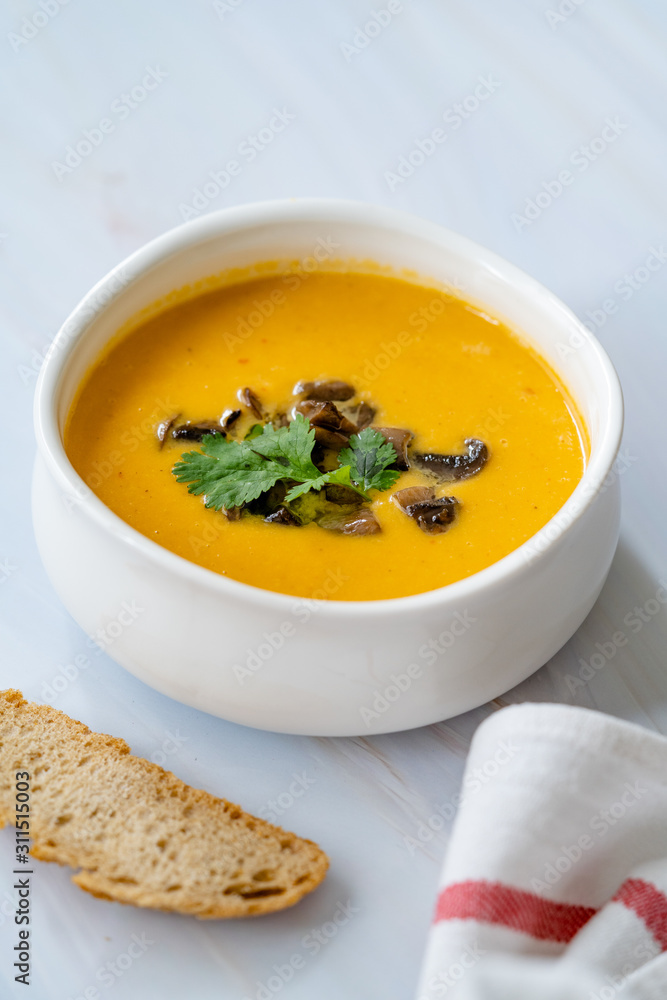 Homemade Thai Sweet Potato Soup with Cilantro, Coconut Milk Cream, Lime and Mushrooms. Homemade Thai Sweet Potato Soup with Cilantro, Coconut Milk Cream, Lime and Mushrooms.
