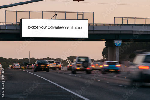 Blank roadside advertising billboard on freeway